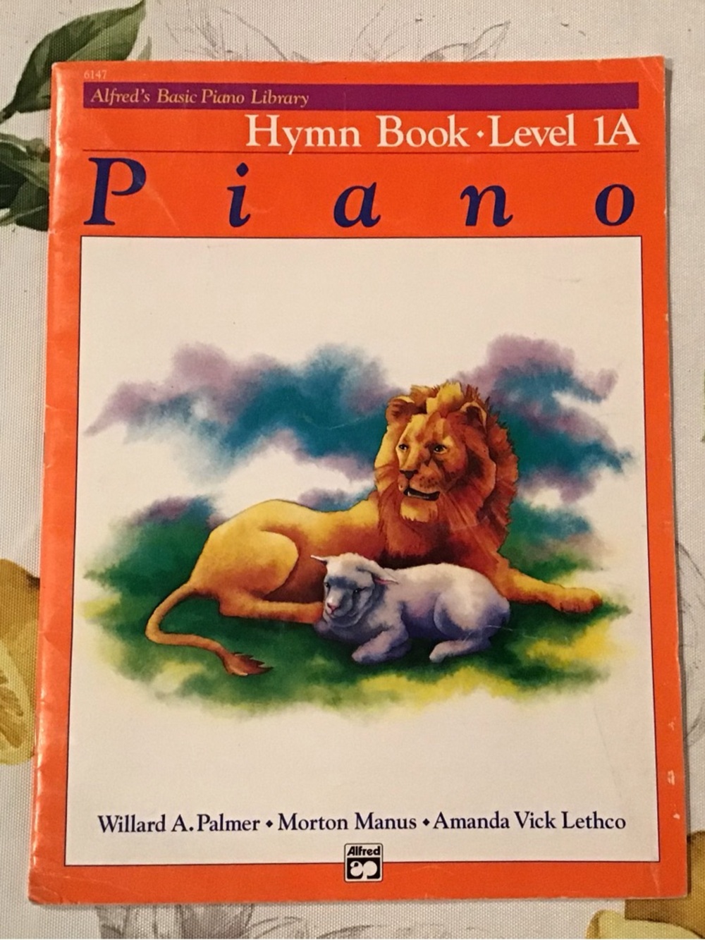 Alfred Piano Hymn Book Level 1A – Blue and Orange Text